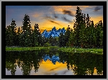 Drzewa, Góry, Teton Range, Rzeka, Snake River, Odbicie, Zachód słońca, Park Narodowy Grand Teton, Wyoming, Stany Zjednoczone